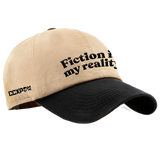 CCXP GORRA BEIGE/NEGRA FICTION IS MY REALITY